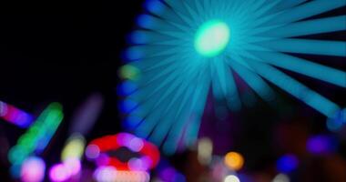 Bokeh Beleuchtung von ein Ferris Rad beim ein Amüsement Park video