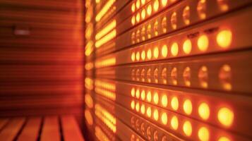 A closeup of the infrared saunas heating panels emitting waves of infrared light believed to trate deeper into the body and provide greater pain relief for migraines. photo