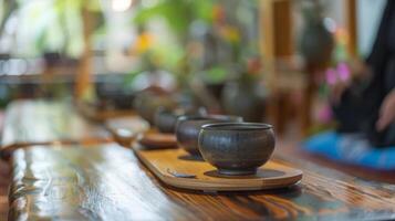 Soft music plays in the background as guests practice mindfulness and take in the peaceful surroundings while sipping on their favorite tea blend photo