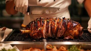 The chef expertly preparing a whole roasted pig a locally raised specialty of the farmtotable menu photo