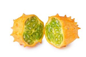 Kiwano or African horned melon slices isolated on white background photo