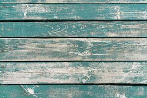 Turquoise weathered aged wooden background photo