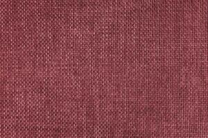 Jacquard woven upholstery, red coarse fabric texture close up photo