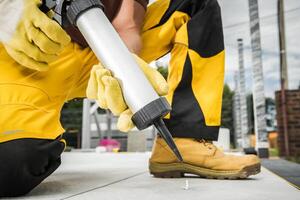 Filling Outdoor Concrete Spaces with a Silicone photo