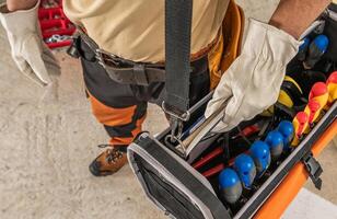 Construction Worker and His Tool Box photo