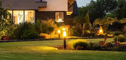 Modern LED Garden Light Posts. Residential Backyard Garden photo