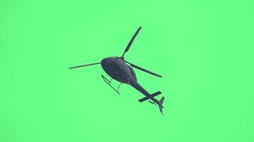 Helicopter flying on green screen low angle camera. Realistic helicopter flying loop animation. Green screen render. Aircraft flight with greenscreen. Aircraft chroma key post production 4k footage. video