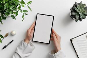 AI generated Elegant Workspace with Digital Tablet and Lush Houseplants on White Background photo