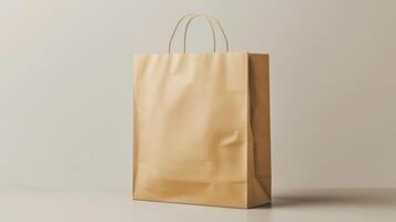 Blank mockup of a brown paper shopping bag with a gusseted bottom. photo