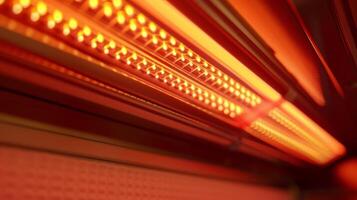 A closeup of the infrared heating panels emitting a comforting glow. photo