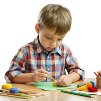 un niño enfocado en haciendo Arte con vibrante materiales png