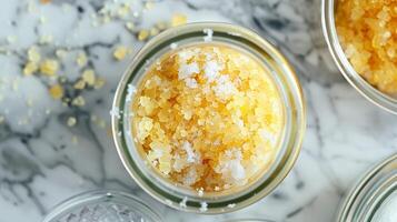 A jar filled with exfoliating ingredients ready to be added to a batch of soap for a luxurious scrub photo