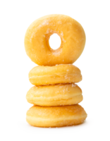 Front view of golden cinnamon donuts in stack isolated with clipping path and shadow in file format png