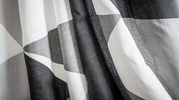 Blank mockup of a geometric shower curtain in shades of gray black and white for a modern touch. photo