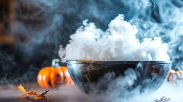 A closeup of a bowl filled with dry ice creating a mysterious and eerie atmosphere at the Halloween party photo