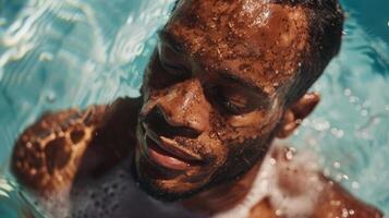 An intimate shot of a man with vitiligo soaking in the sun while proudly showing off his natural skin in a campaign celebrating diversity and all forms of beauty photo