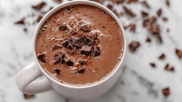 A vegan hot chocolate made with dairyfree milk and topped with a sprinkle of dairyfree chocolate shavings perfect for those with dietary restrictions photo