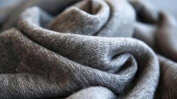 A luxurious cashmere scarf made from ethically raised and harvested goats demonstrating that sustainable fashion can also prioritize animal welfare photo