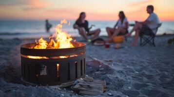 Theres nothing quite like the camaraderie around a beach fire pit with friends and families gathered around cooking and enjoying the beautiful beach views photo