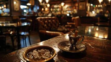 A vintage cigarette holder rests in an ashtray on one table adding to the authenticity of the speakeasy experience photo