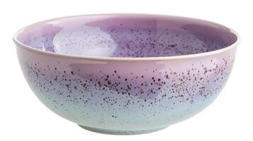 A delicate porcelain bowl with a speckled glaze effect showcasing soft pastel colors of lavender pink and light blue. photo