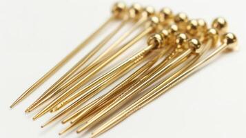 A set of goldplated quilting pins designed with smooth tips to prevent snagging delicate fabrics photo