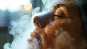 A person receiving an infrared sauna session with steam and heat helping to unclog pores and detoxify the skin. photo