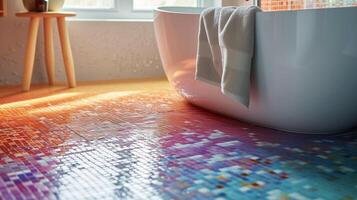 A closeup shot of a handlaid mosaic tile floor in a vibrant color gradient creating a visually stunning effect in a bathroom photo