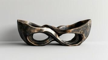 Blank mockup of a curved bronze sculpture plaque depicting abstract figures intertwined. photo