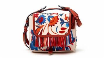 A mini crossbody bag in a bold eyecatching print adorned with tassels and fringe for a playful touch photo