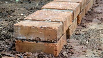 An upclose view of the precision and patience required for laying bricks perfectly in line photo