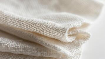 A set of muslin face cloths perfect for removing makeup and exfoliating made from organic cotton photo