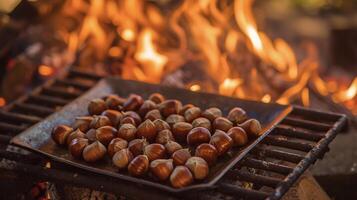 As the flames dance and flicker a tray of chestnuts rests over the fire slowly roasting to perfection. The result A delightful snack thats both hearty and wholesome perfec photo