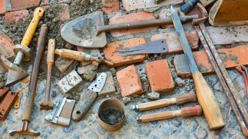 An array of tools laid out ready for use as the masons continue their bricklaying photo