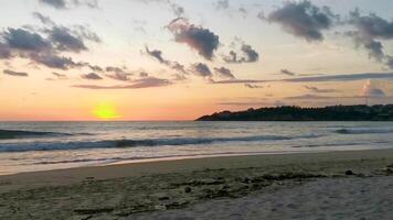 Colorful golden sunset big wave tropical beach Puerto Escondido Mexico. video