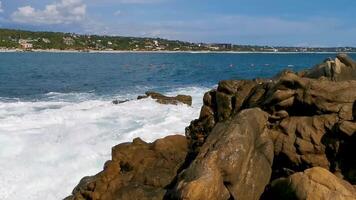 Beautiful rocks cliffs view waves at beach coast panorama Mexico. video