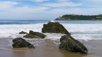 Beautiful rocks cliffs view waves at beach coast panorama Mexico. video