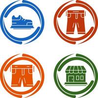 Zapatos y pantalones icono vector