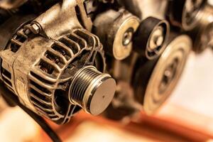 Alternator Pulley on Car Engine photo