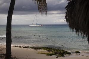 Boat on the sea with storm photo