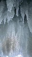 large icicles in an ice cave on Lake Baikal, Siberia, Russia. photo