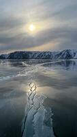 Landscape Shamanka rock natural ice breaking frozen water Lake Baikal Siberia photo