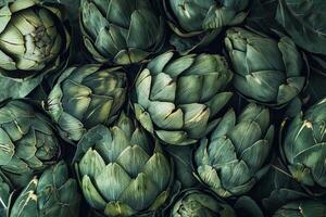 Abstract pattern of overlapping artichoke leaves, creative use of texture and green tones photo