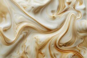 Close up of milk cream swirling in coffee, viewed from above against a brown to cream gradient background photo