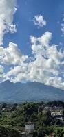 Beautiful landscape morning view of Mount Salak or Gunung Salak taken from batu tulis area in central Bogor city Indonesia photo