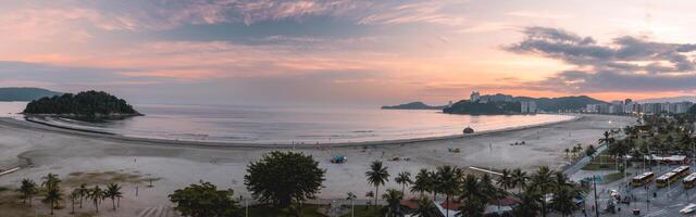 Panorama from the coast of Santos and Sao Vicente Brazil, during sunset. photo