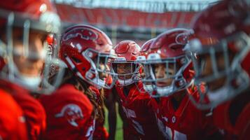 joven americano fútbol americano jugadores Listo para el juego en rojo uniformes foto