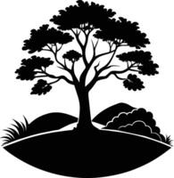 Silhouette of a tree with grass vector