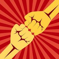 two fists are holding each other on a red and yellow background vector