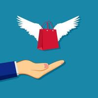 hand with shopping bag and wings on blue background vector